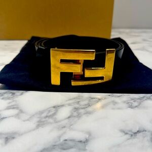 Black and gold Fendi belt